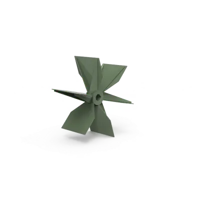Small green windmill model with four blades on a snowy white surface.