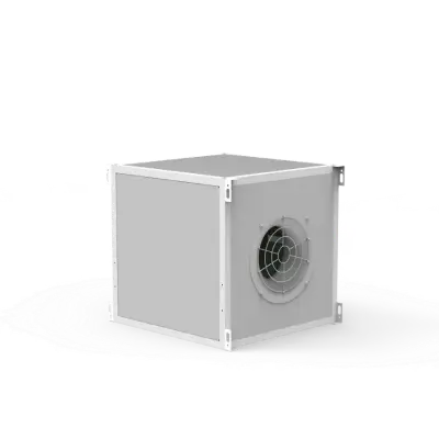 Square metal ventilation unit with a circular fan grille on its side, resting on a light surface.